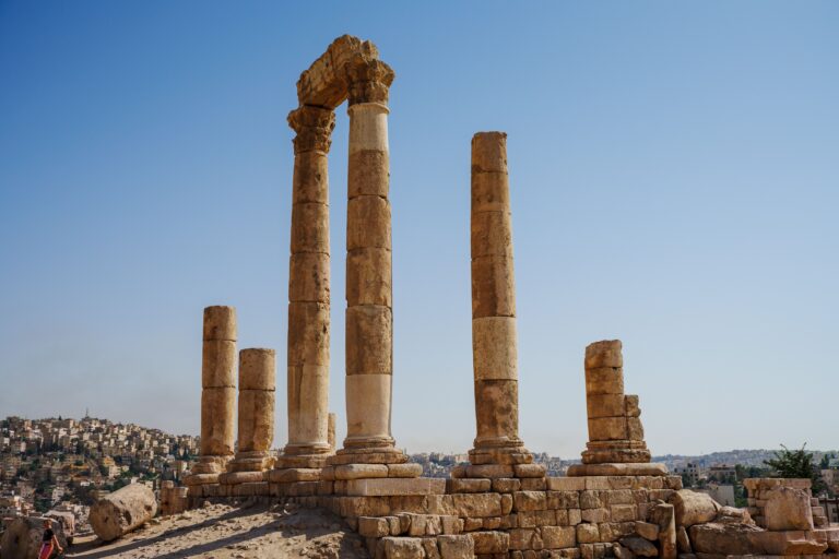 An ancient columns with blue sky in the background, AMMAN JORDAN