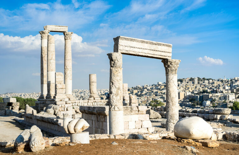 Ancient roman ruins of the citadel on top of Amman city - Jordan capital in middle east - Travel wonder concept with Temple of Hercules named in arab language Jabal al-Qal'a - Bright vivid filter